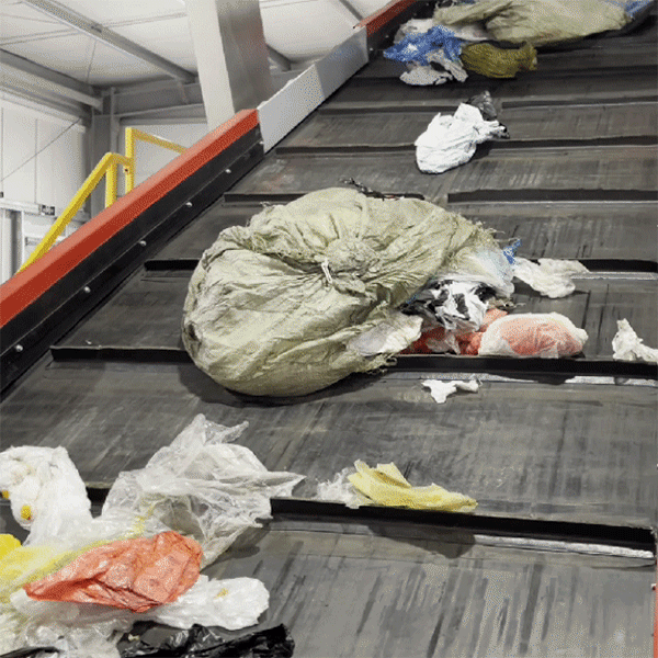 Conveyor Infeed Alimentación del transportador