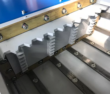 Estructura de empujador de material